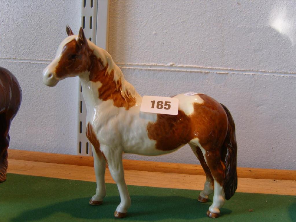 Appraisal: A Beswick model of a brown and white pony -