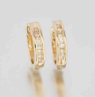 Appraisal: A Pair of Ladies' Diamond Hoop Earrings k yellow gold