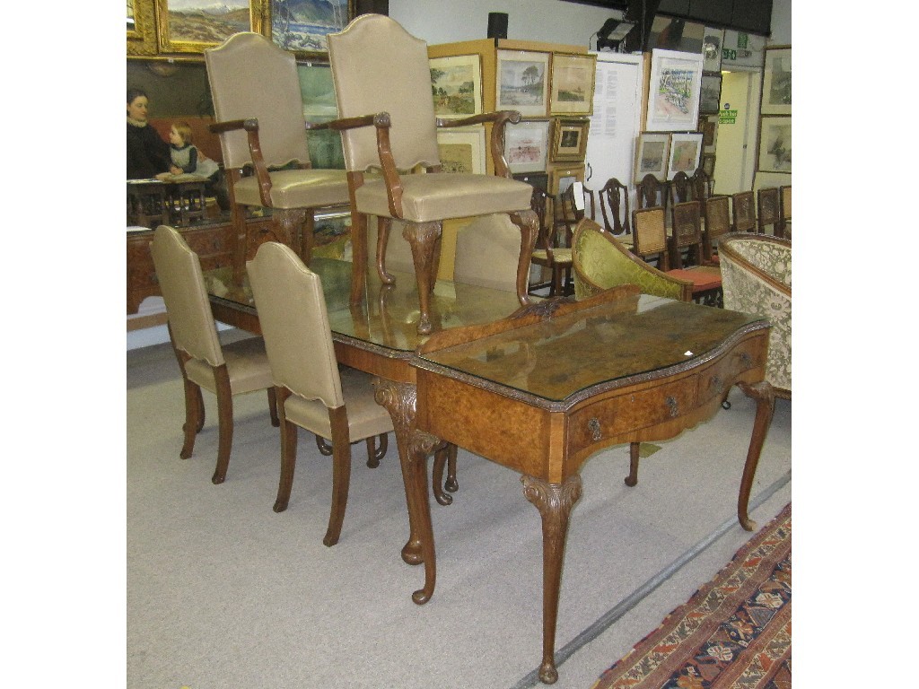 Appraisal: Walnut nine piece dining room suite comprising serpentine sideboard dining