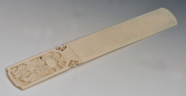 Appraisal: A CHINESE CANTON IVORY PAPER KNIFE reverse carved fruits flowers