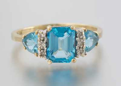 Appraisal: A Ladies' Topaz and Diamond Ring k yellow gold ring