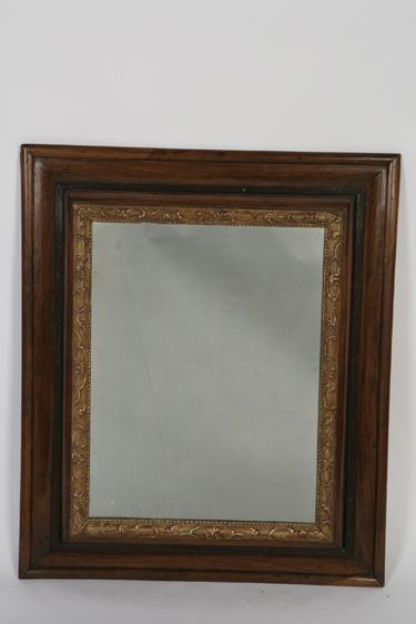 Appraisal: A MAHOGANY FRAMED WALL MIRROR the rectangular plate within a