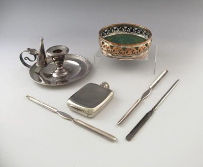 Appraisal: A mixed lot of electroplated items comprising A chamber stick