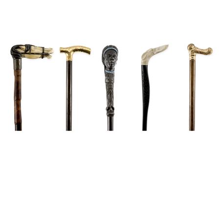 Appraisal: Group of Canes and Parasols Together with a Brass Umbrella