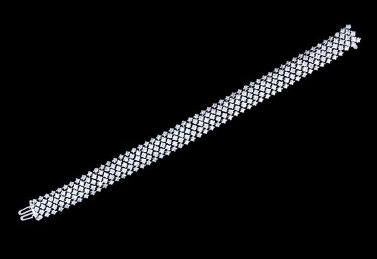 Appraisal: Flexible bangle bracelet multi-rows consisting of round brilliant-cut diamonds ctw