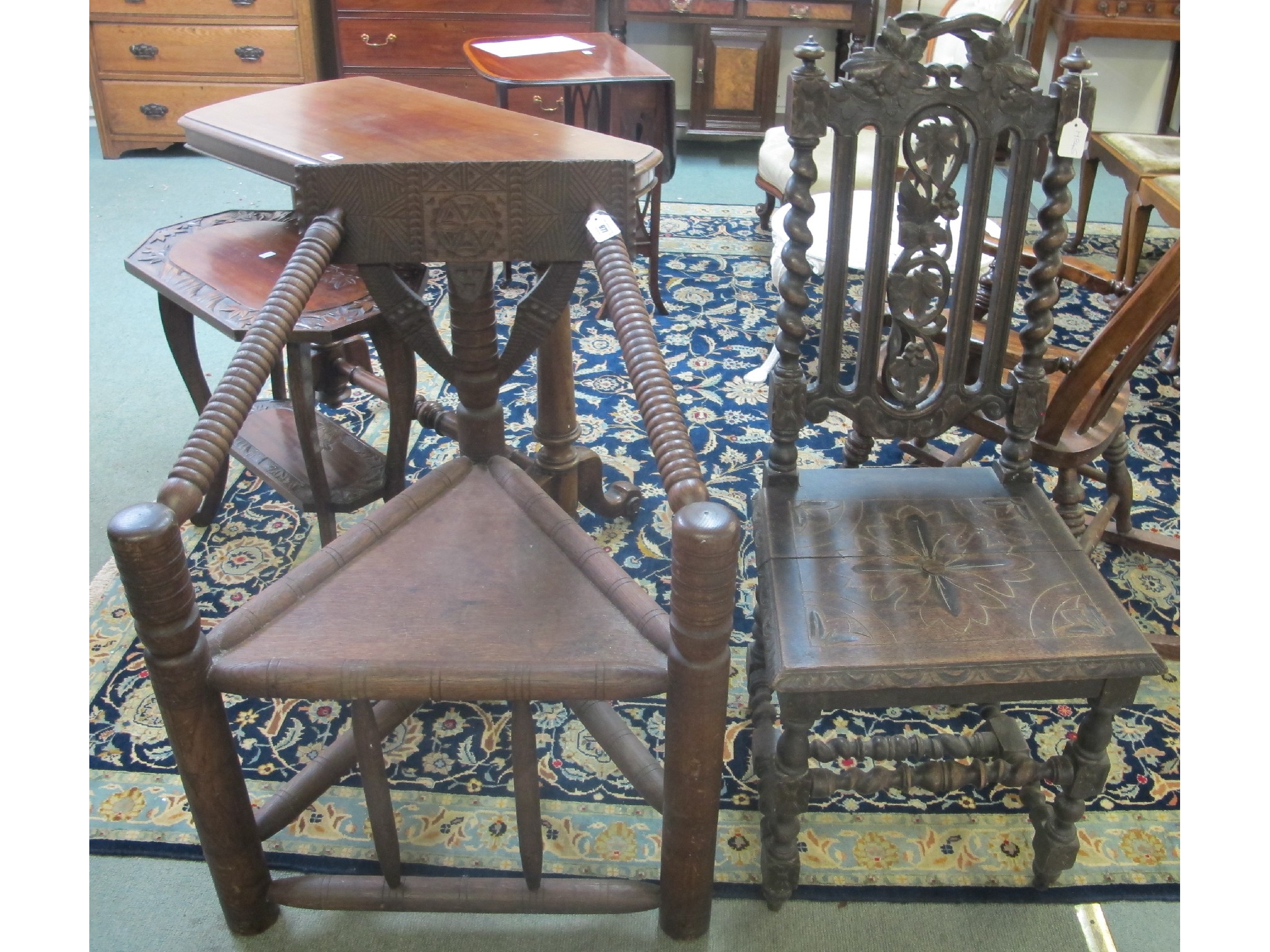 Appraisal: An oak carved hall chair and another carved chair