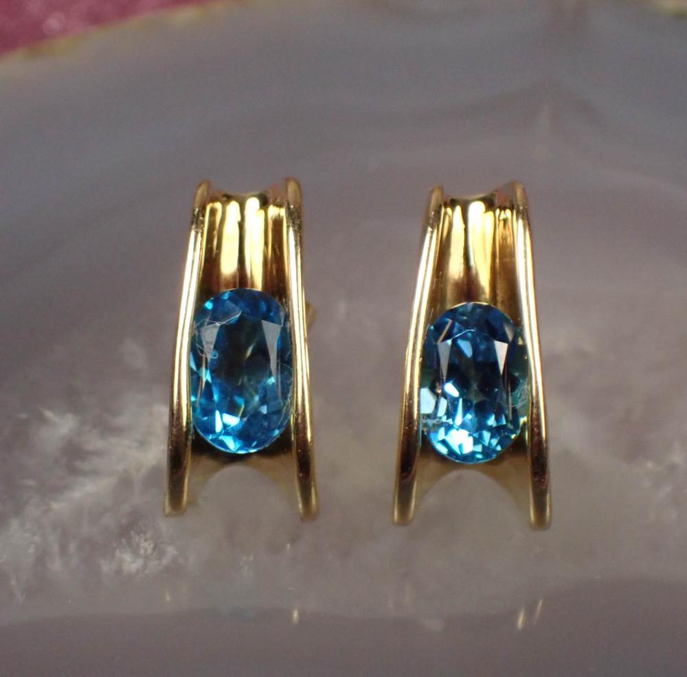 Appraisal: PAIR OF BLUE TOPAZ AND FOURTEEN KARAT GOLD EARRINGS each