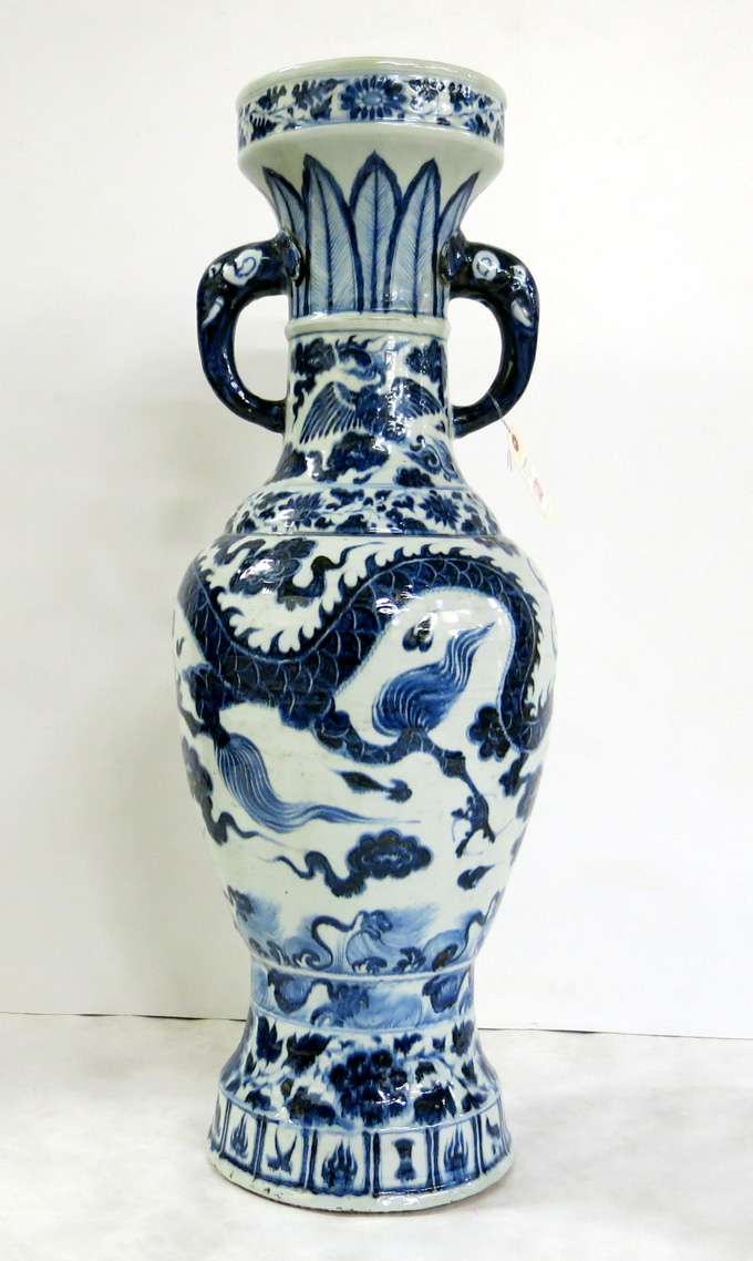 Appraisal: CHINESE PORCELAIN FLOOR VASE featuring blue underglaze decoration on off-white