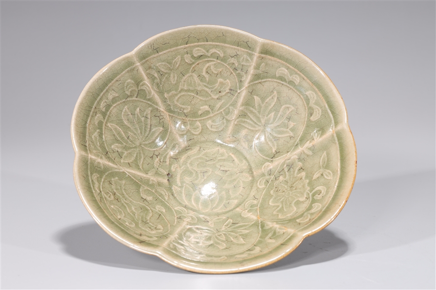 Appraisal: Chinese celadon glazed bowl with floral designs to interior overall