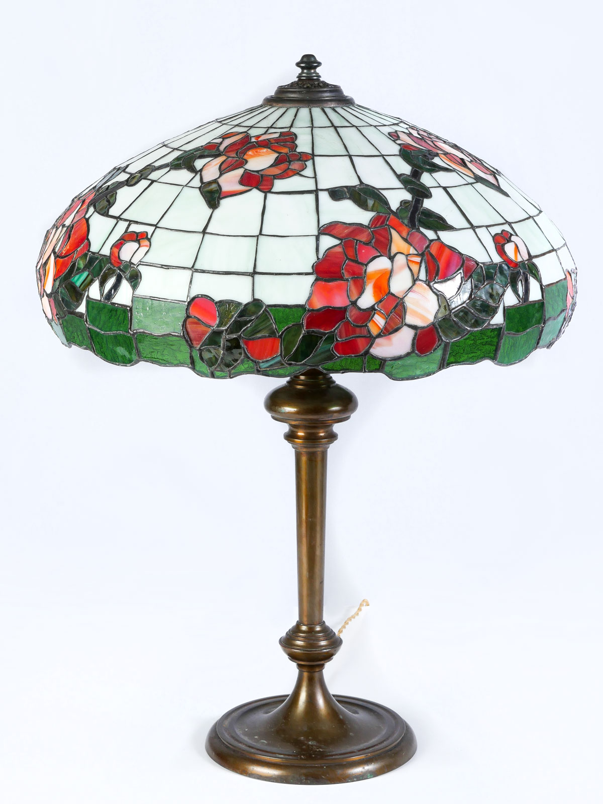 Appraisal: WILKINSON CO LEADED GLASS AND BRASS ROSE LAMP light bronze