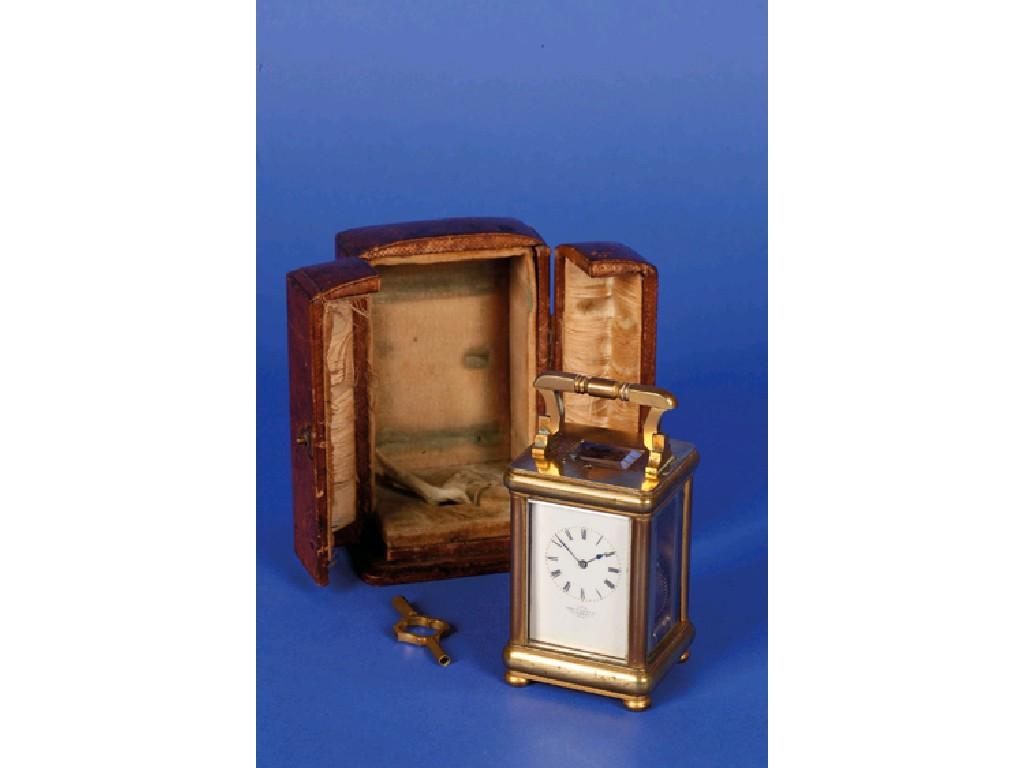 Appraisal: A MINIATURE FRENCH BRASS CASED REPEATING CARRIAGE CLOCK the cream