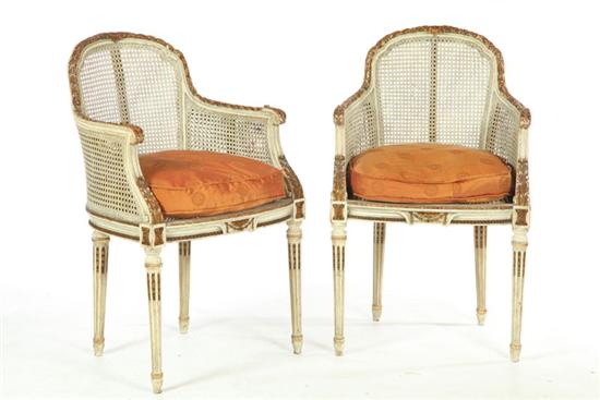 Appraisal: PAIR OF LOUIS XVI-STYLE ARMCHAIRS France th century Carved frame