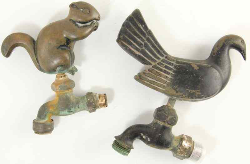 Appraisal: Pair of Figural Bronze Faucet Handles th century consisting of