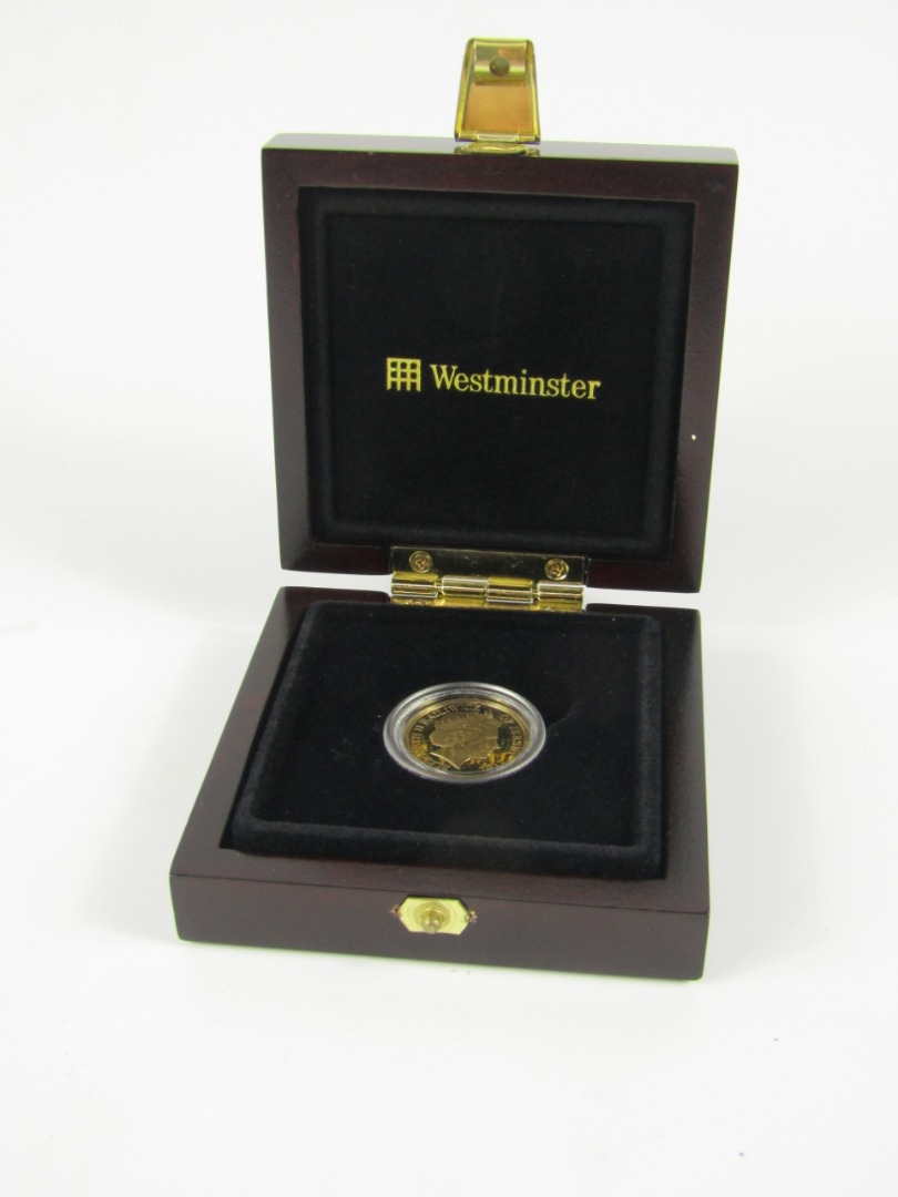 Appraisal: A Royal Wedding Jersey gold sovereign boxed with certificate