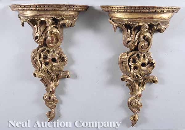 Appraisal: A Pair of Rococo-Style Carved and Gilt Brackets each with