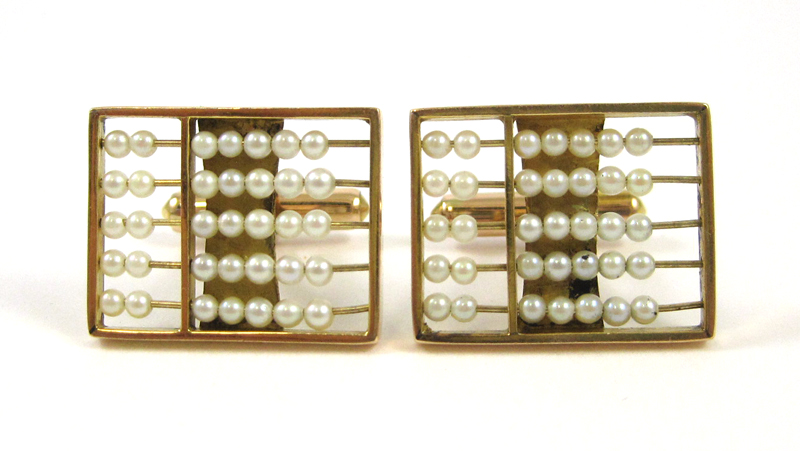 Appraisal: PEARL AND FOURTEEN KARAT GOLD CUFFLINKS each having five yellow