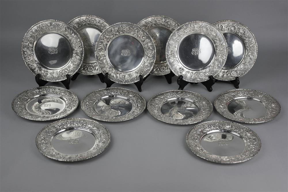 Appraisal: AMERICAN REPOUSSE SILVER BREAD AND BUTTER PLATES early th Century