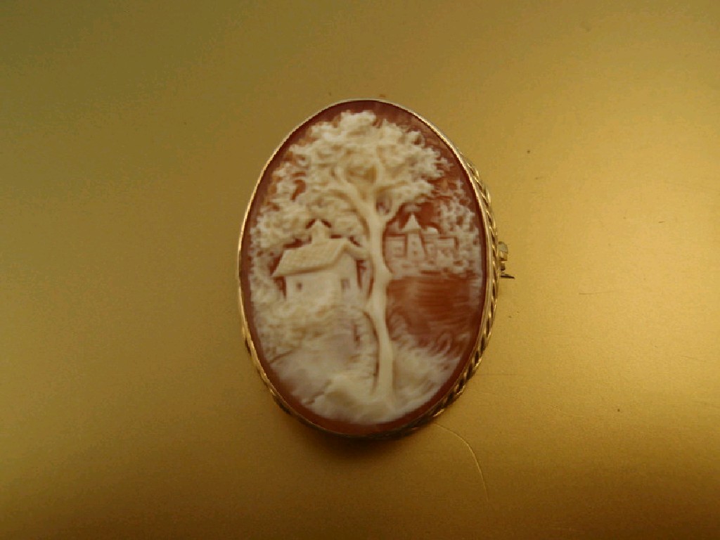 Appraisal: A small shell cameo of an oriental landscape in ct