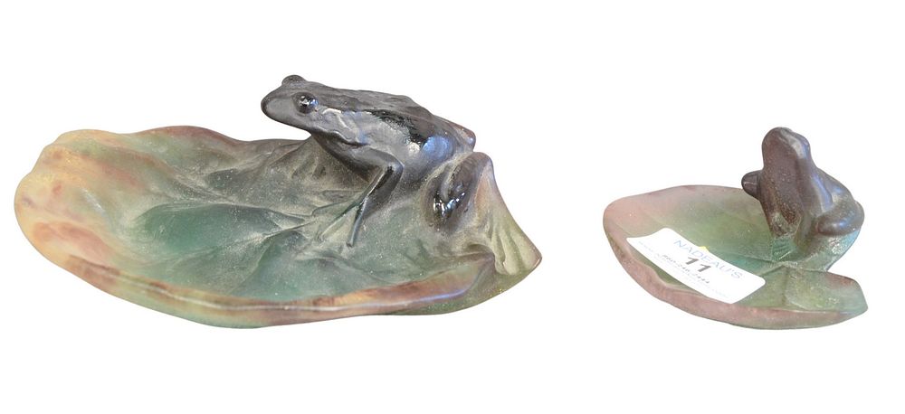 Appraisal: Pair of Daum Glass Frogs on Lily Pads signed on