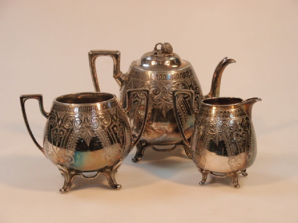 Appraisal: An Early thC electroplated three piece tea service of melon