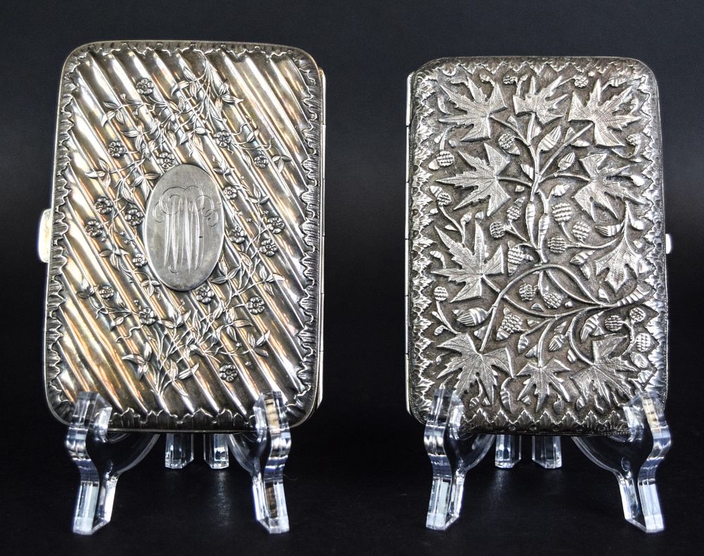 Appraisal: Silver Cigarette Cases with leaf decoration unmarked x hallmarked James