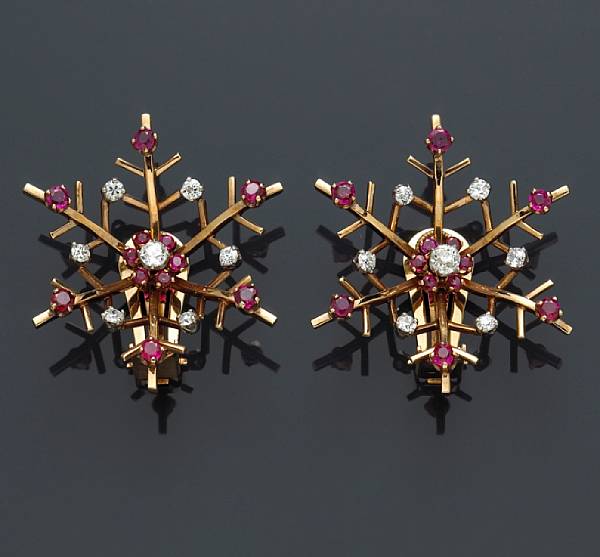 Appraisal: A pair of retro ruby and diamond snowflake clip-earrings mounted