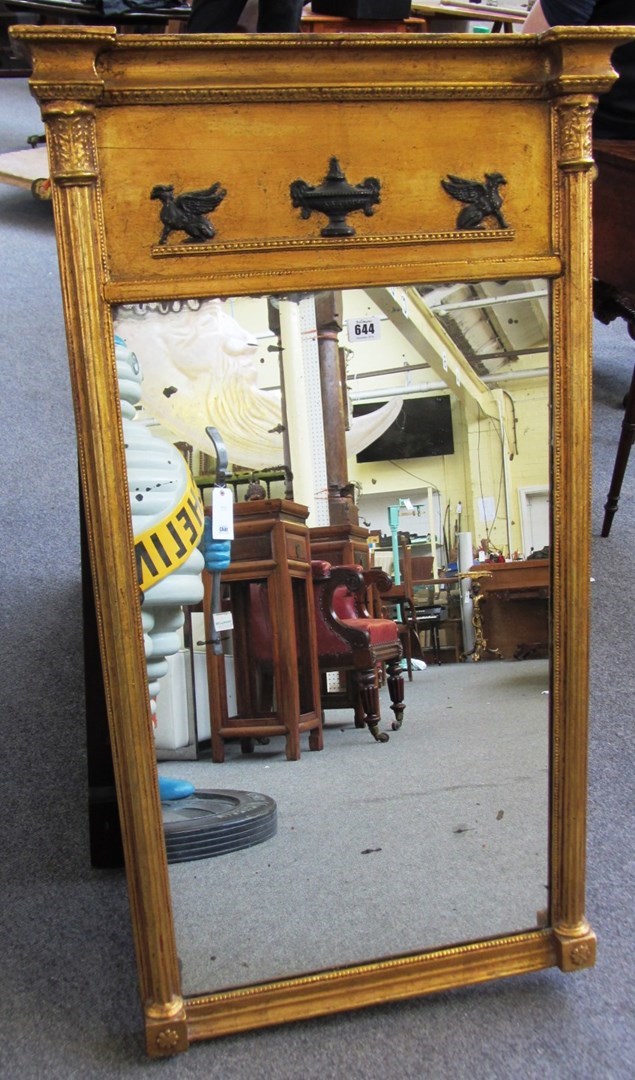 Appraisal: A Regency gilt framed rectangular wall mirror with fluted column