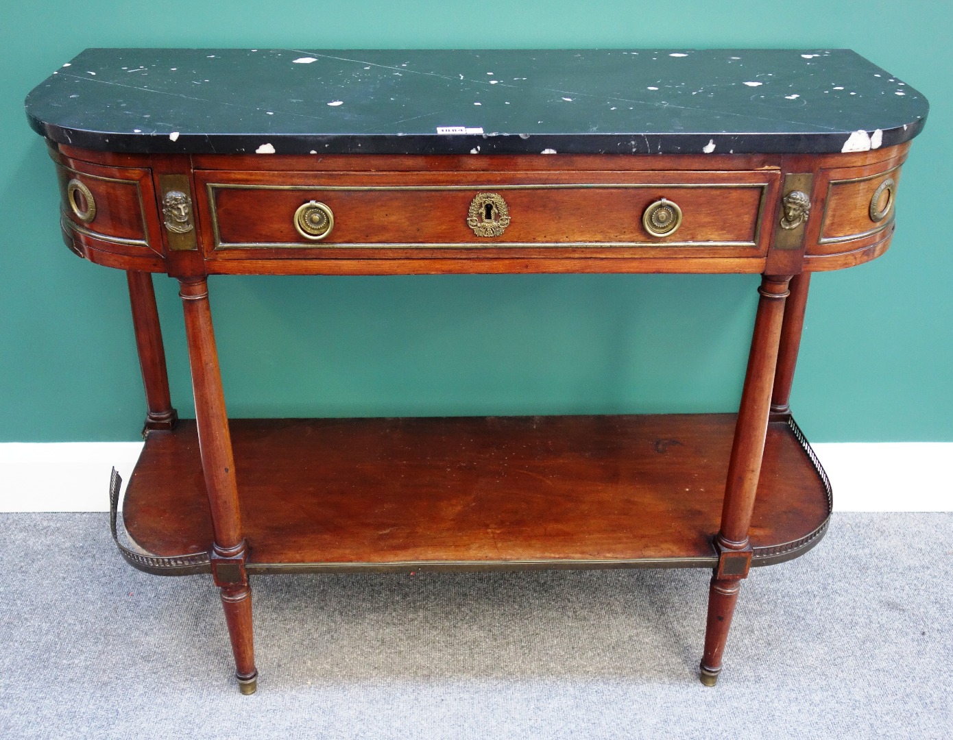 Appraisal: An Empire design side table the rounded marble top over