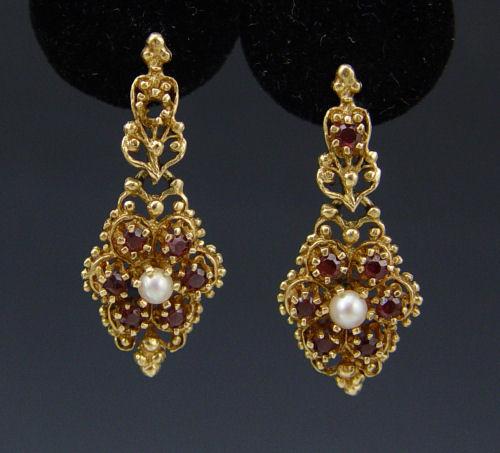 Appraisal: K GARNET CULTURED PEARL EARRINGS K yellow gold earrings contain