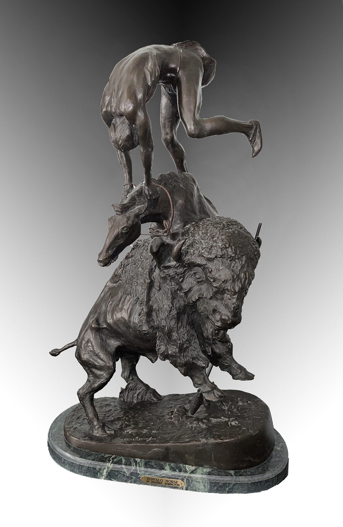 Appraisal: LARGE BRONZE WESTERN GROUPING AFTER REMINGTON Buffalo Horse approximately ''