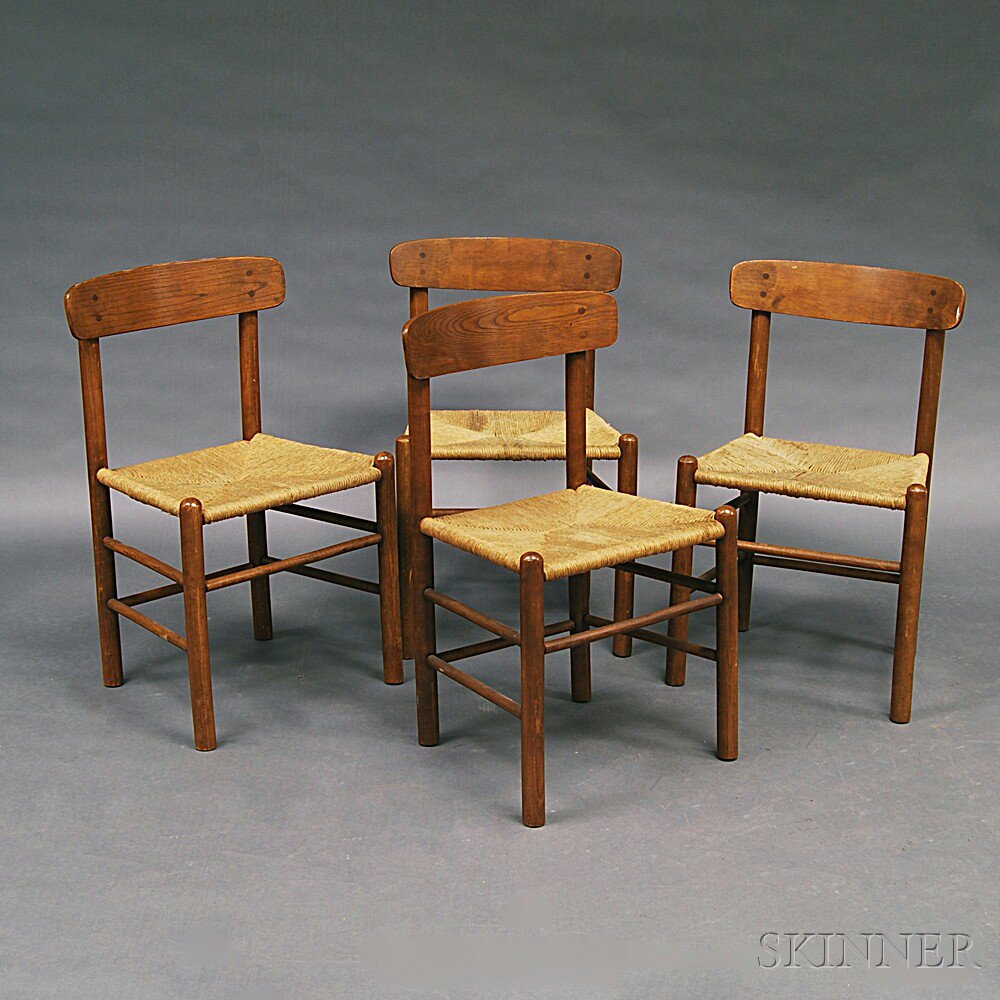 Appraisal: Four Scandinavian Design Dining Chairs probably Denmark the shaped back