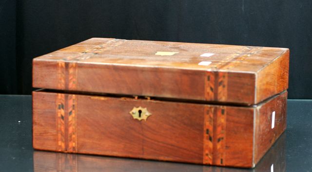 Appraisal: A th century mahogany and geometrically inlaid writing box cms