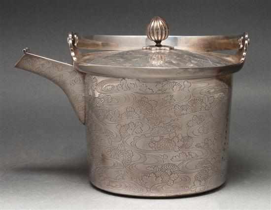 Appraisal: Japanese engraved silver wine pot th century engraved floral decoration