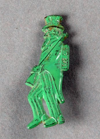 Appraisal: Uncle Sam Marching to War lapel pin metal with green