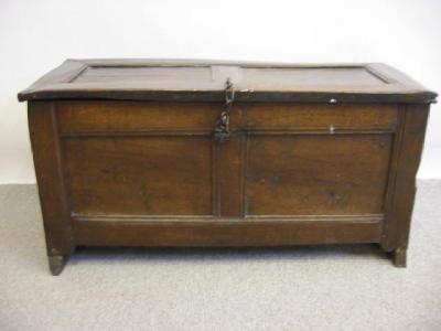 Appraisal: AN OAK PANELLED COFFER th century the moulded lid with