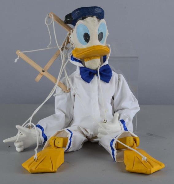 Appraisal: Donald Duck Carved Wood Marionette This painted wood Donald is