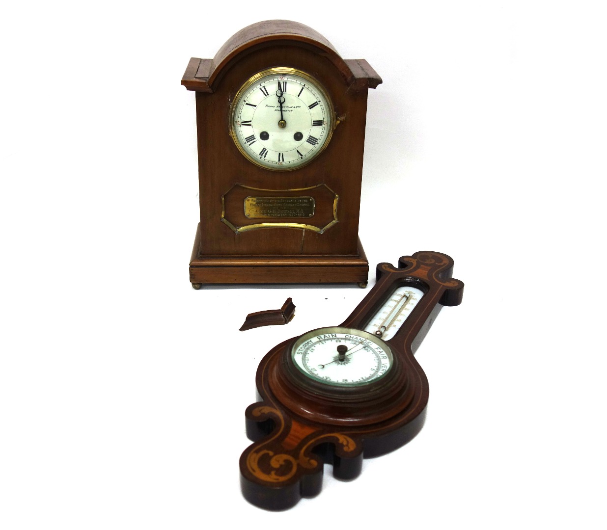 Appraisal: An Edwardian walnut arched top case mantel clock signed Thomas