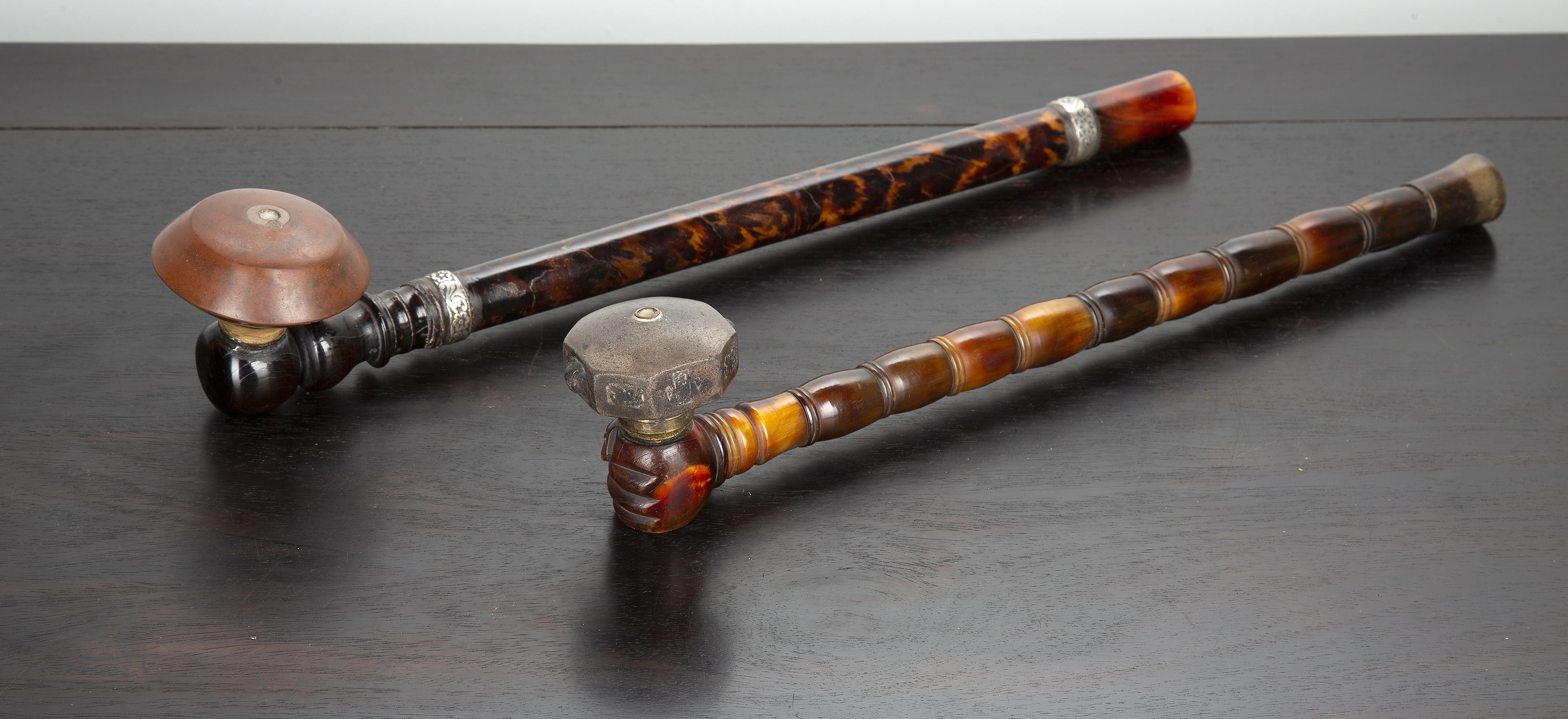 Appraisal: Two tortoiseshell opium pipesChinese late th Century one of ribbed