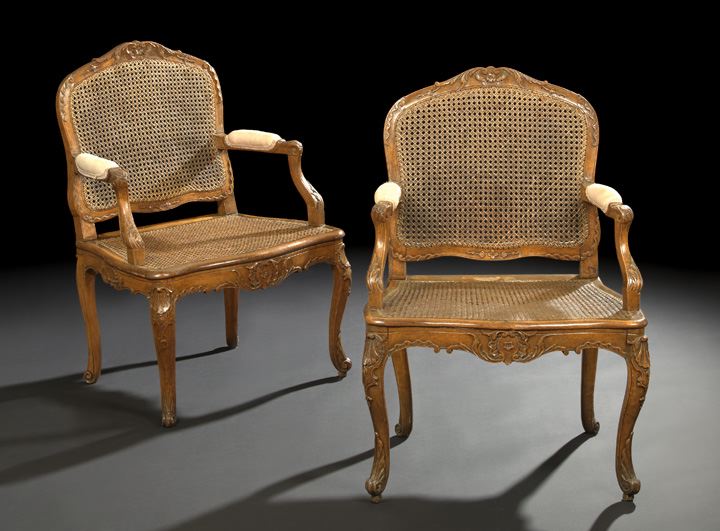 Appraisal: Pair of Louis XV Provincial Fruitwood Fauteuils fourth quarter th