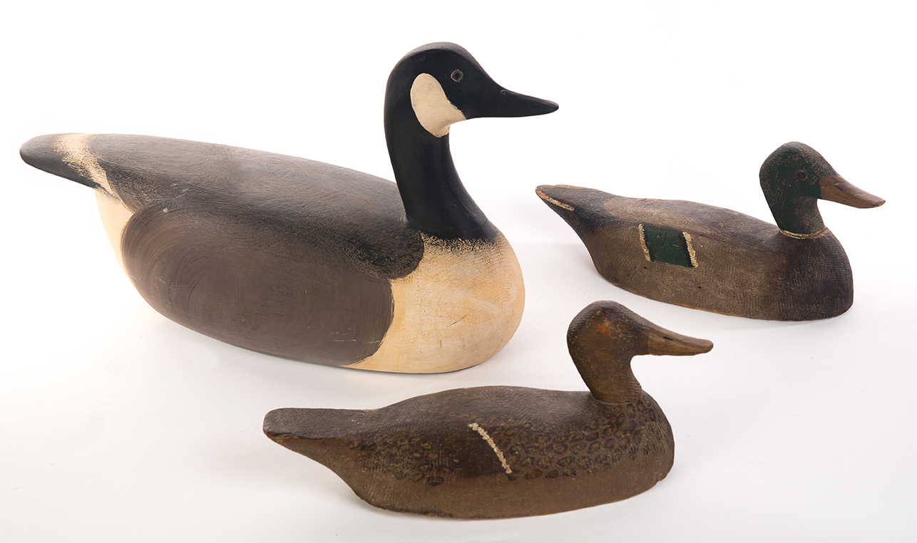 Appraisal: THREE DECOYS WITH GOOD PAINT American th century Large Canada