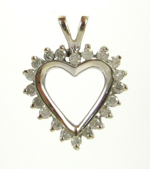 Appraisal: DIAMOND AND FOURTEEN KARAT WHITE GOLD PENDANT The open heart