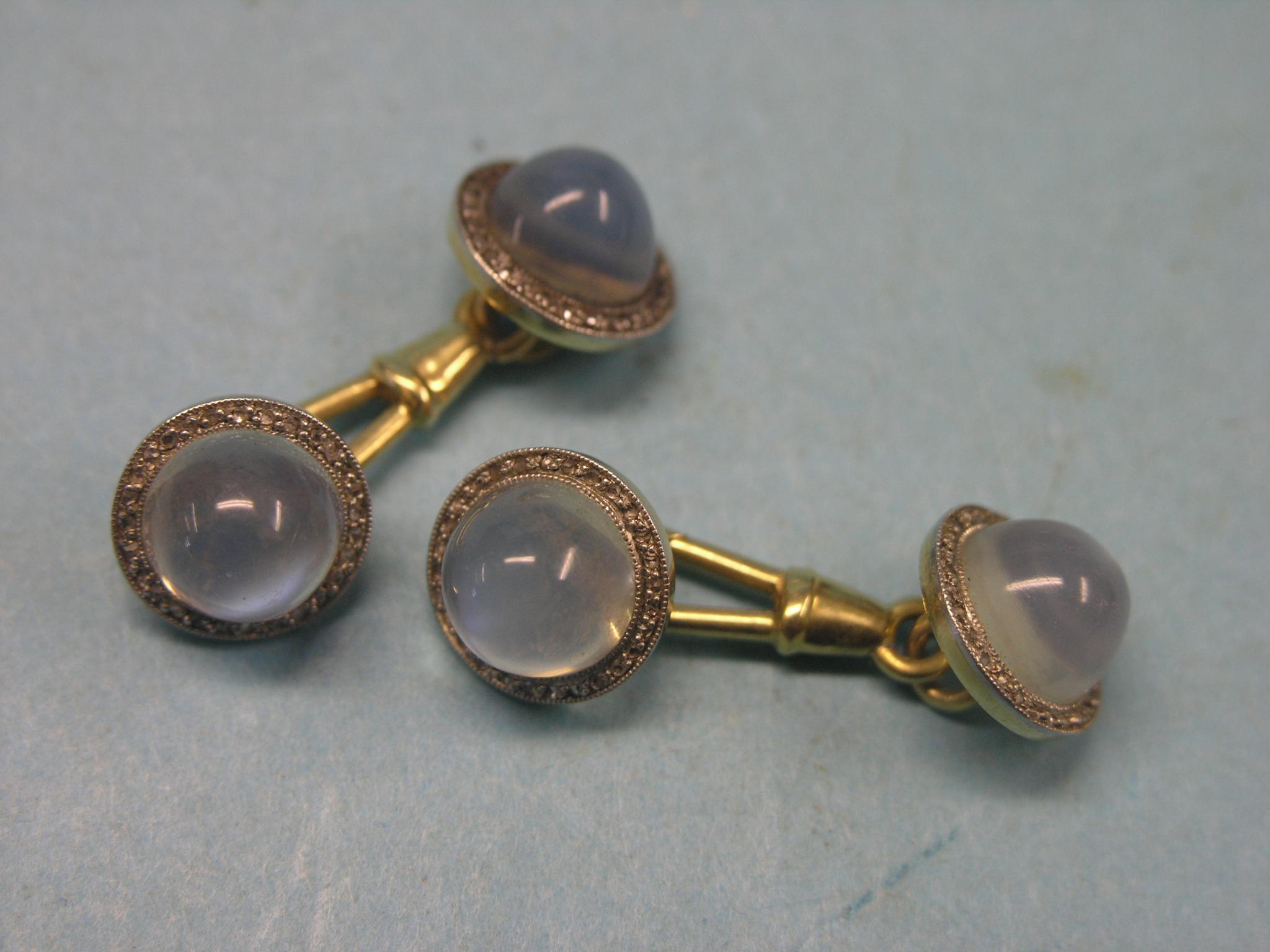 Appraisal: A pair of yellow metal and moonstone cuff-links radially set