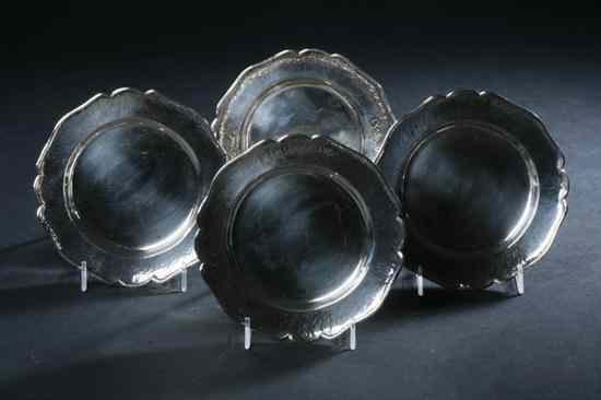 Appraisal: EIGHT SILVER BREAD AND BUTTER PLATES Possibly Mexican silver standard