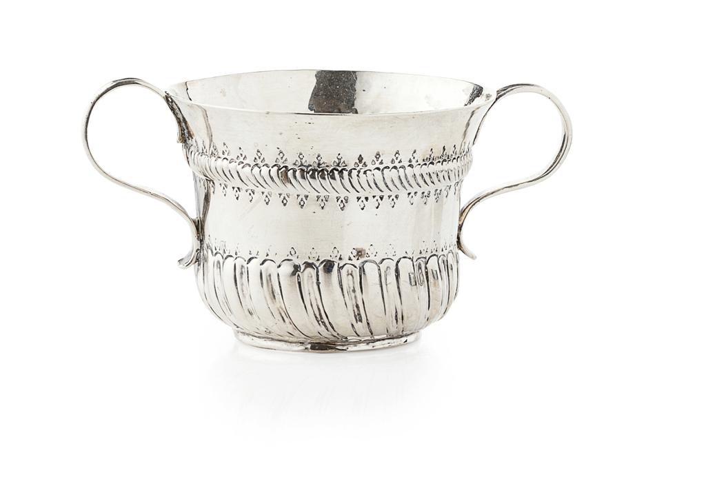 Appraisal: An th century porringer London circa of traditional form two