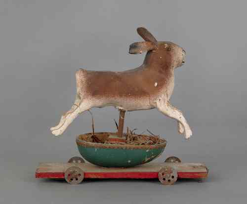 Appraisal: Composition rabbit pull toy early th c mounted to a