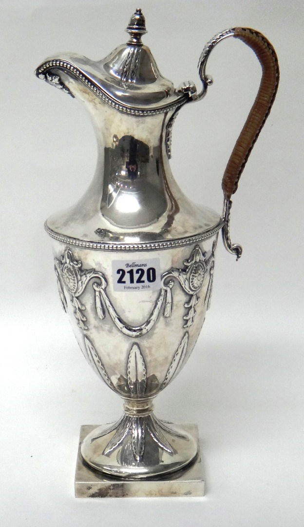 Appraisal: A Victorian Scottish silver claret jug of Adam style form