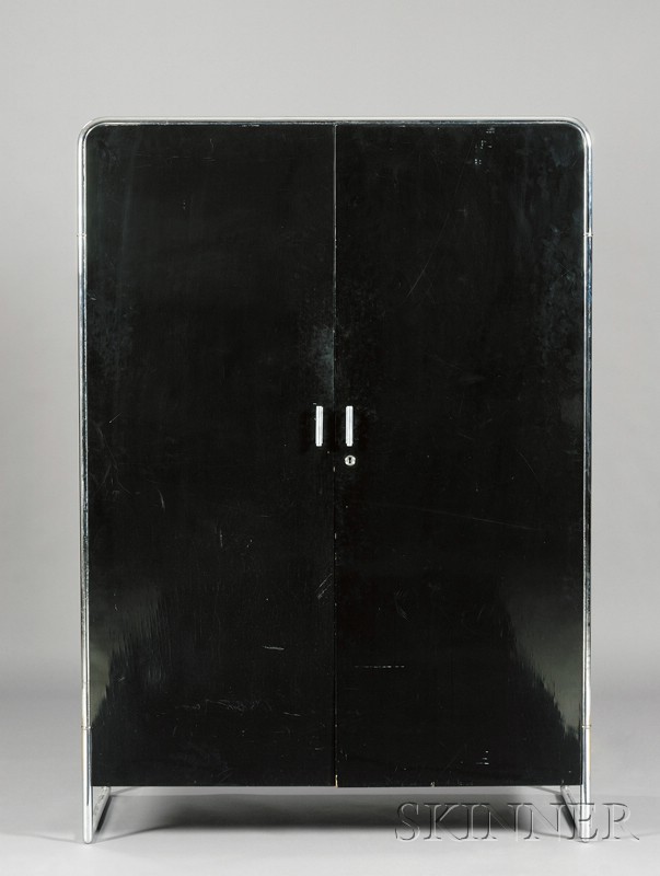 Appraisal: Modernist Armoire Black lacquered wood and tubular steel Attributed to