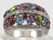 Appraisal: A white metal tests carat gold tutti frutti multi gem