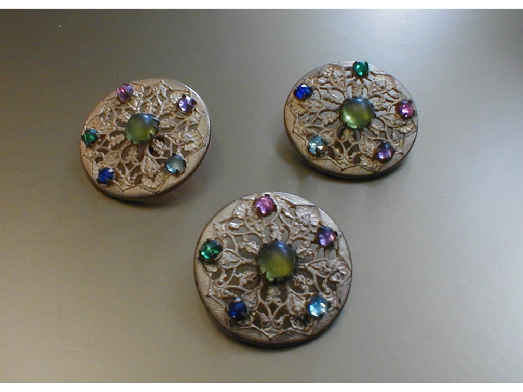 Appraisal: A set of pierced base metal buttons set with multi