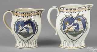 Appraisal: Two Pratt pearlware mischievous pitchers th c '' h and